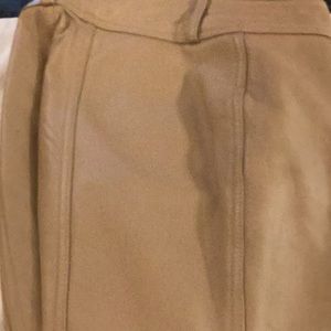 Taupe-beige, leather pants lined.